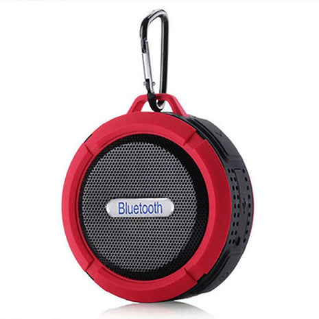 Waterproof Mini Speaker with Bluetooth, mic, and volume control in red and black design. Features a carabiner clip for portable use in wet environments.