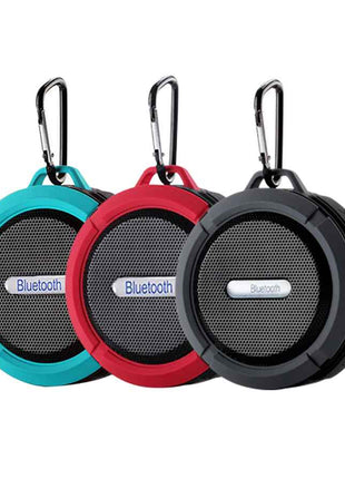 Waterproof Mini Speaker with Bluetooth, mic, and volume control in teal, red, and black colors. Ideal for shower or outdoor use with carabiner clip.